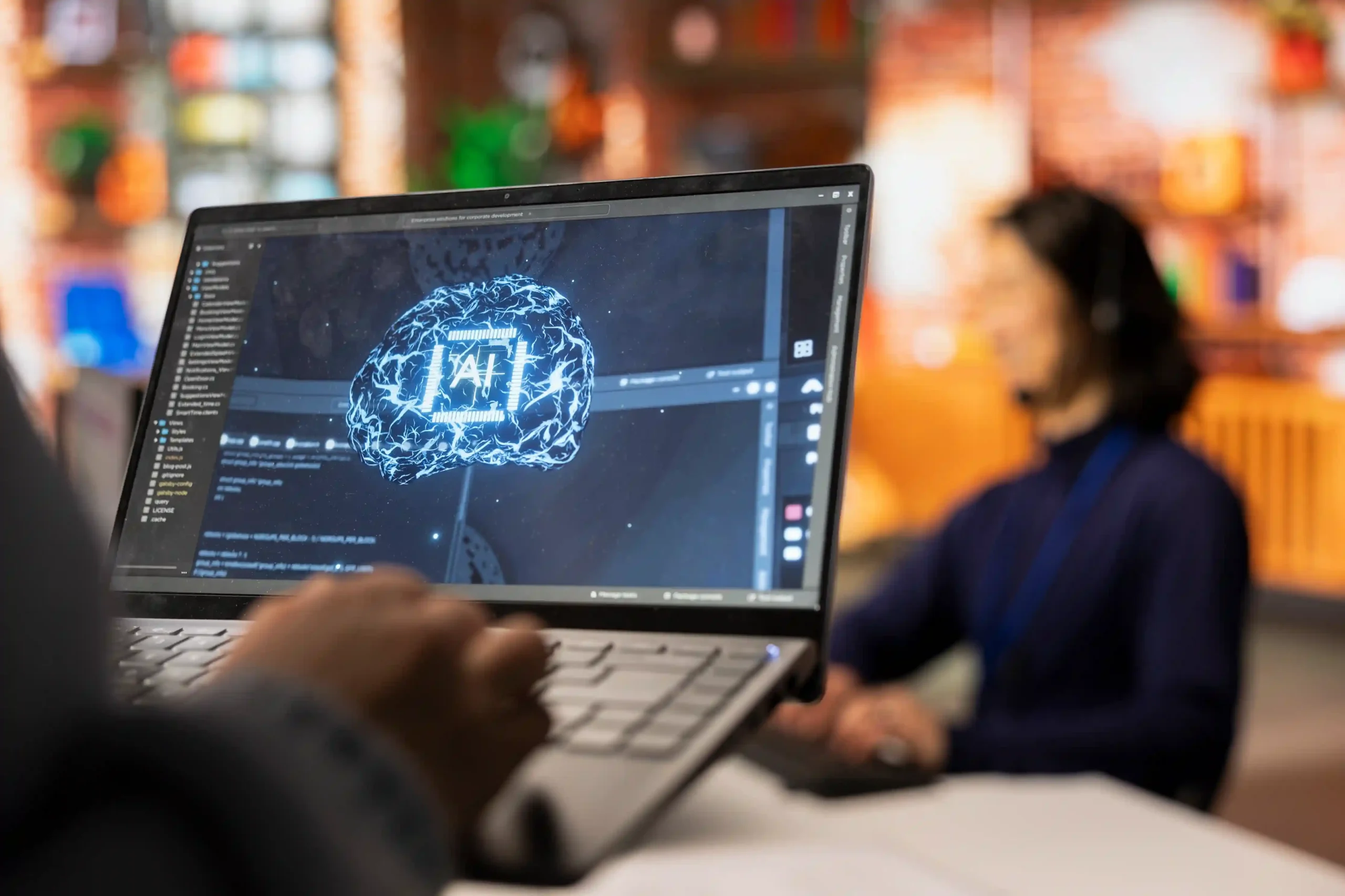 Laptop screen showing AI brain graphic and software
