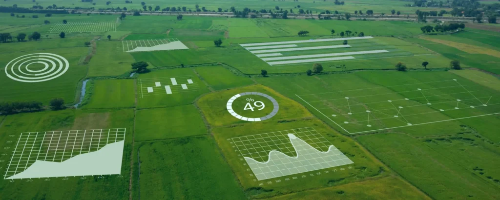 A green field featuring various graphs and charts displayed across its surface, symbolizing data analysis and growth.