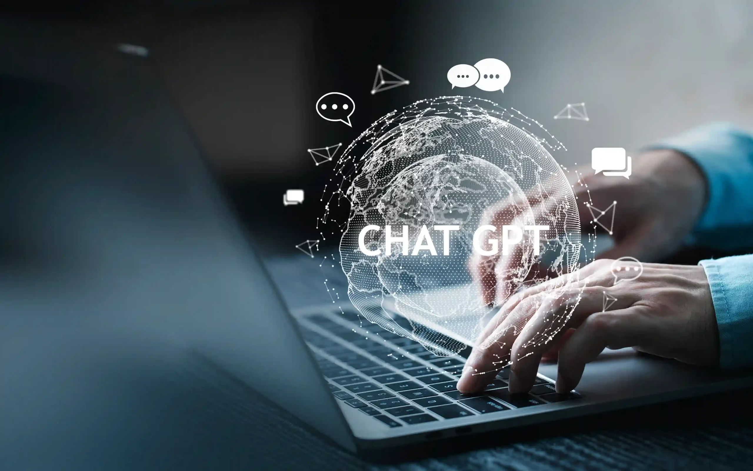 Person using laptop with ChatGPT 5 global AI visuals